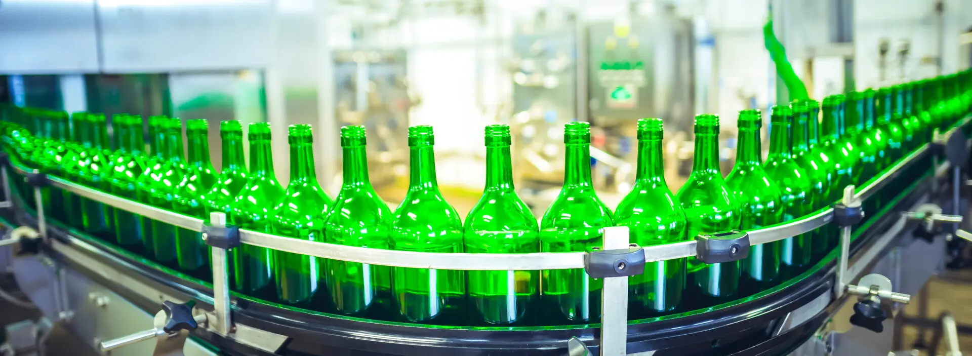 Beer,Or,Wine,Bottles,On,The,Conveyor,Belt.,Bottling,Alkoholic